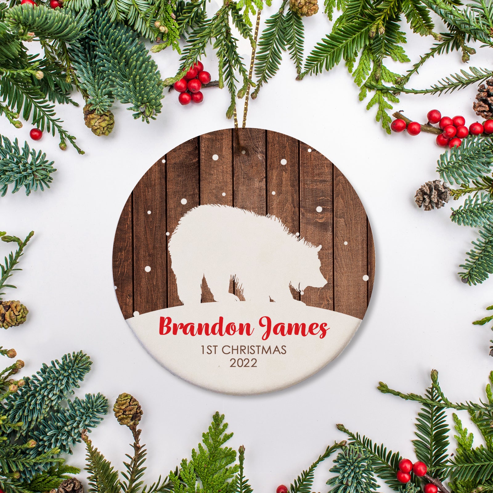Bear silhouette with Wood background | Personalized Ornament with name in red | 1st Christmas and year in brown block text | Baby's First Christmas | Pipsy.com