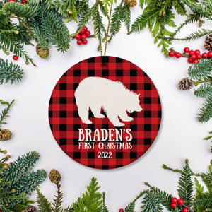 Personalized Christmas ornament featuring silhouette of bear on a red and black buffalo plaid. Child's name and year on the front with optional back text - Pipsy.com