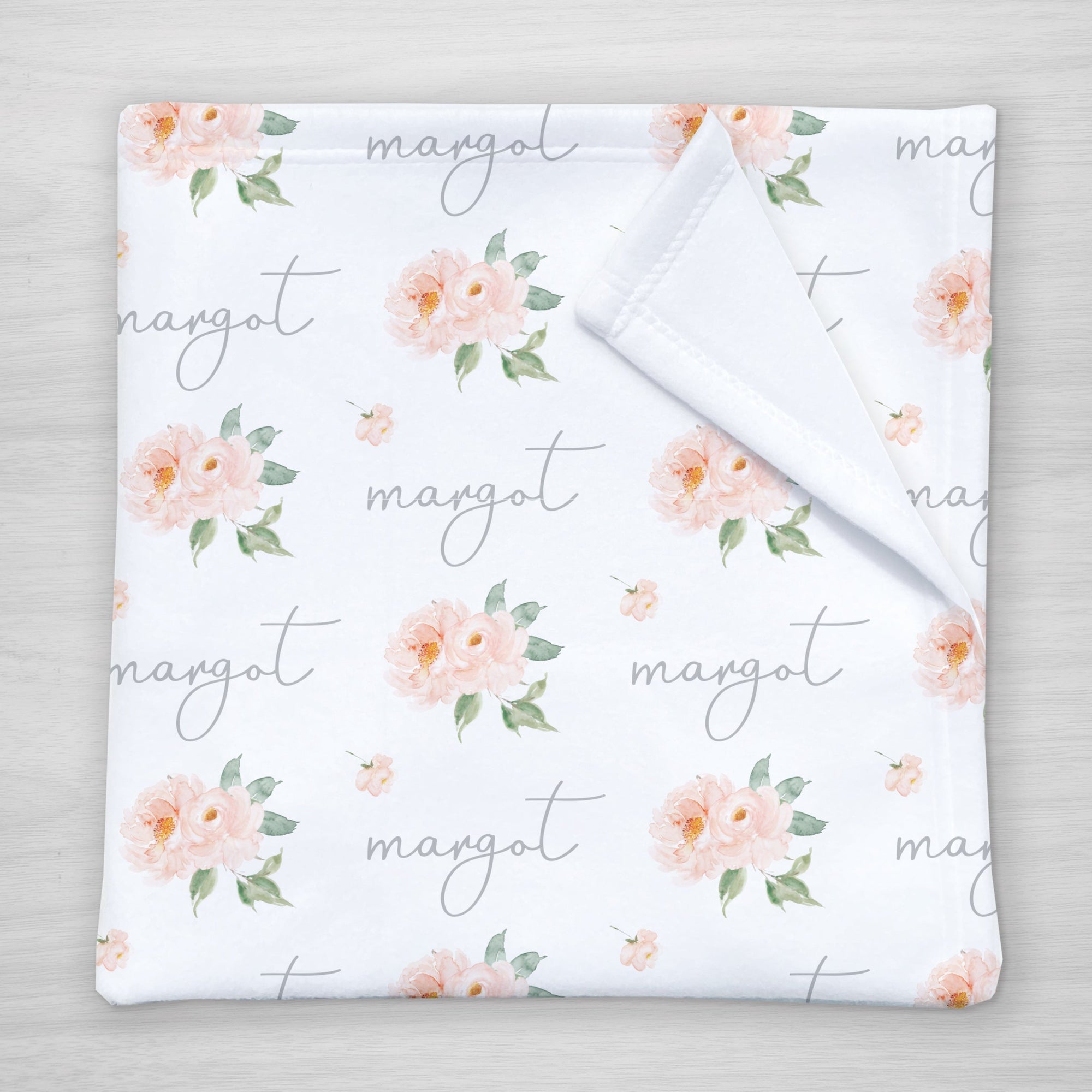 Blush Roses make the perfect accent for this personalized baby swaddle blanket | Pipsy.com