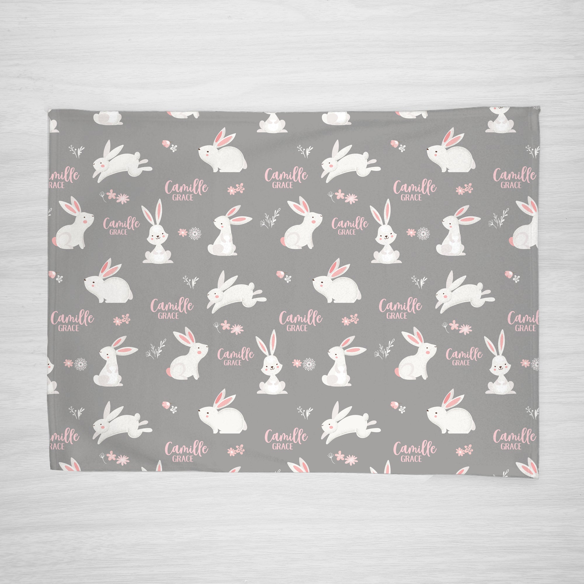 Bunny Rabbit children's blanket, personalized with name. Soft gray fleece background with white and pink accents. Great for babies, toddlers, or older kids, full view