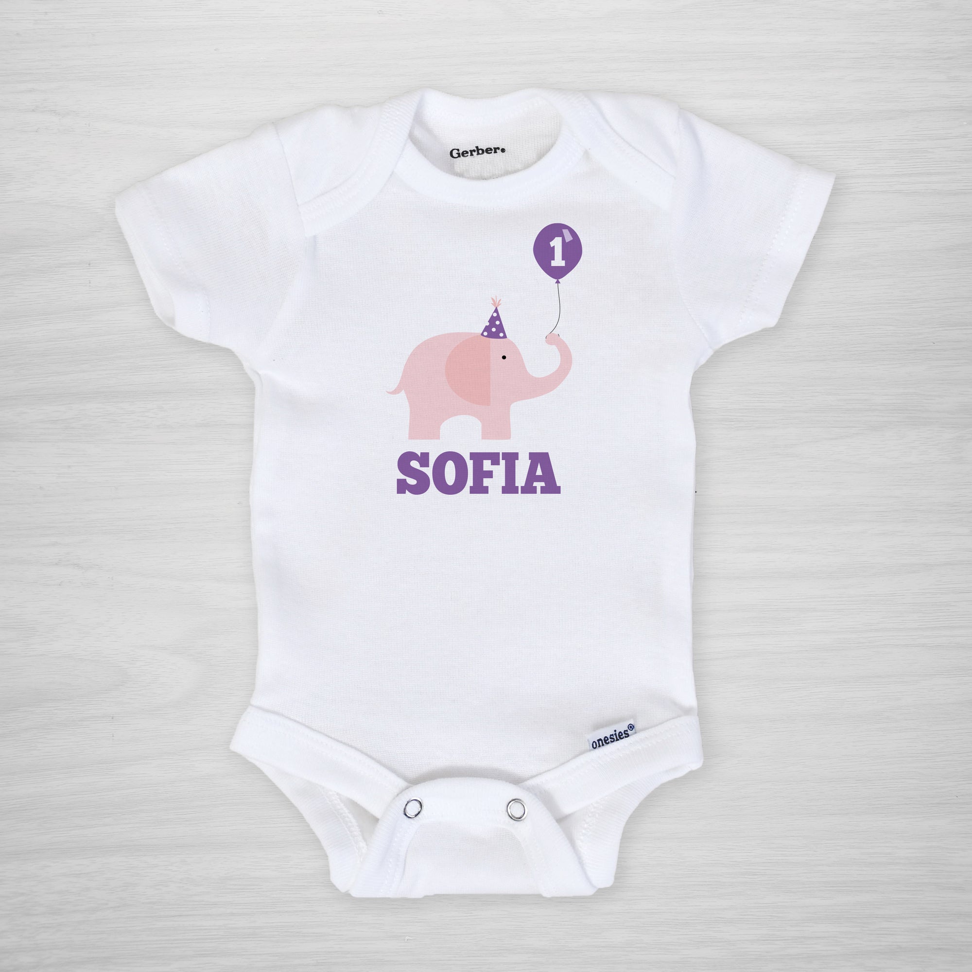 First Birthday Personalized Gerber Onesie, pink elephant with party hat balloon, short sleeved, Pipsy.com