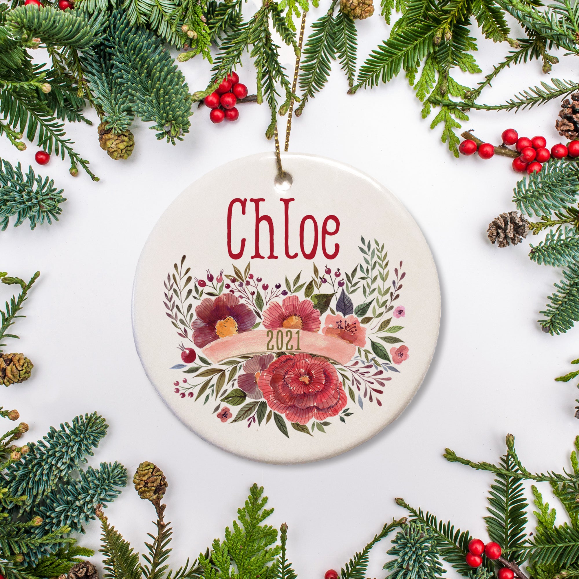 Floral Bunch Keepsake Christmas Ornament Festive floral bunch with banner displaying the year across the bunch. Name across the top.| Pipsy.com