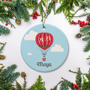 Hot Air Balloon with the year on the balloon. Blue sky with clouds. Personalized with name | Pipsy.com