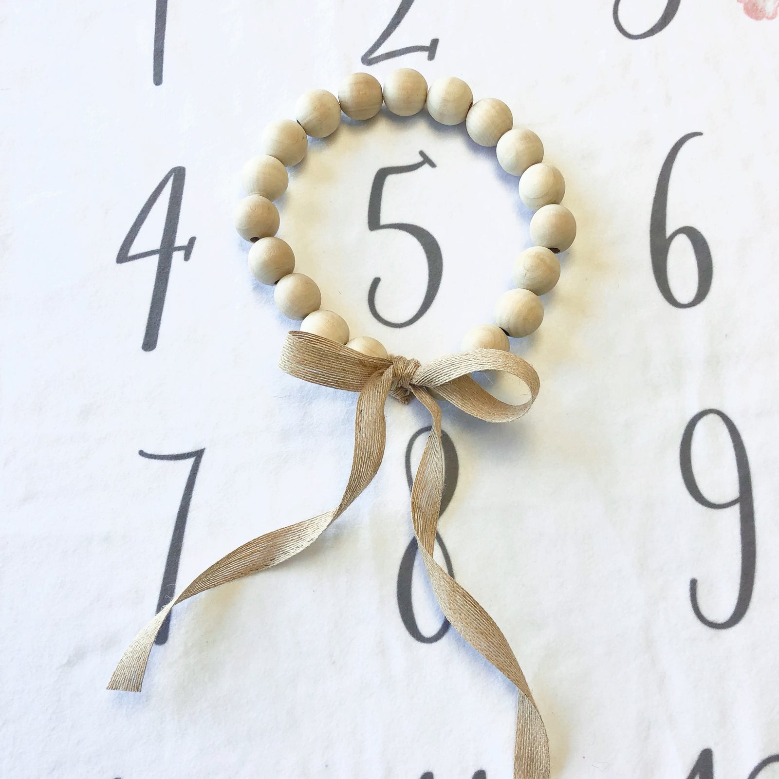 Milestone Marker Wreath, wooden beads with jute ribbon
