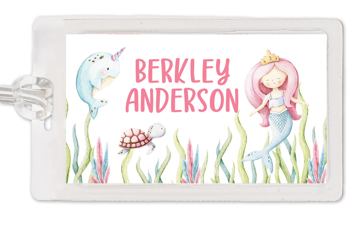 Mermaid Bag Tag, Laminated and two sided, featuring a mermaid  with pink hair and her friends the narwhal and sea turtle