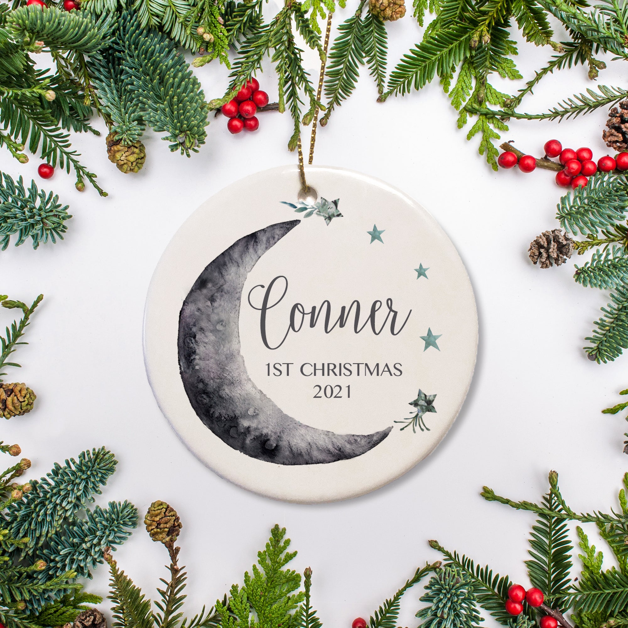 Moon and Stars personalized Christmas Ornament - Name along with 1st Christmas nestled in the moon | Pipsy.com