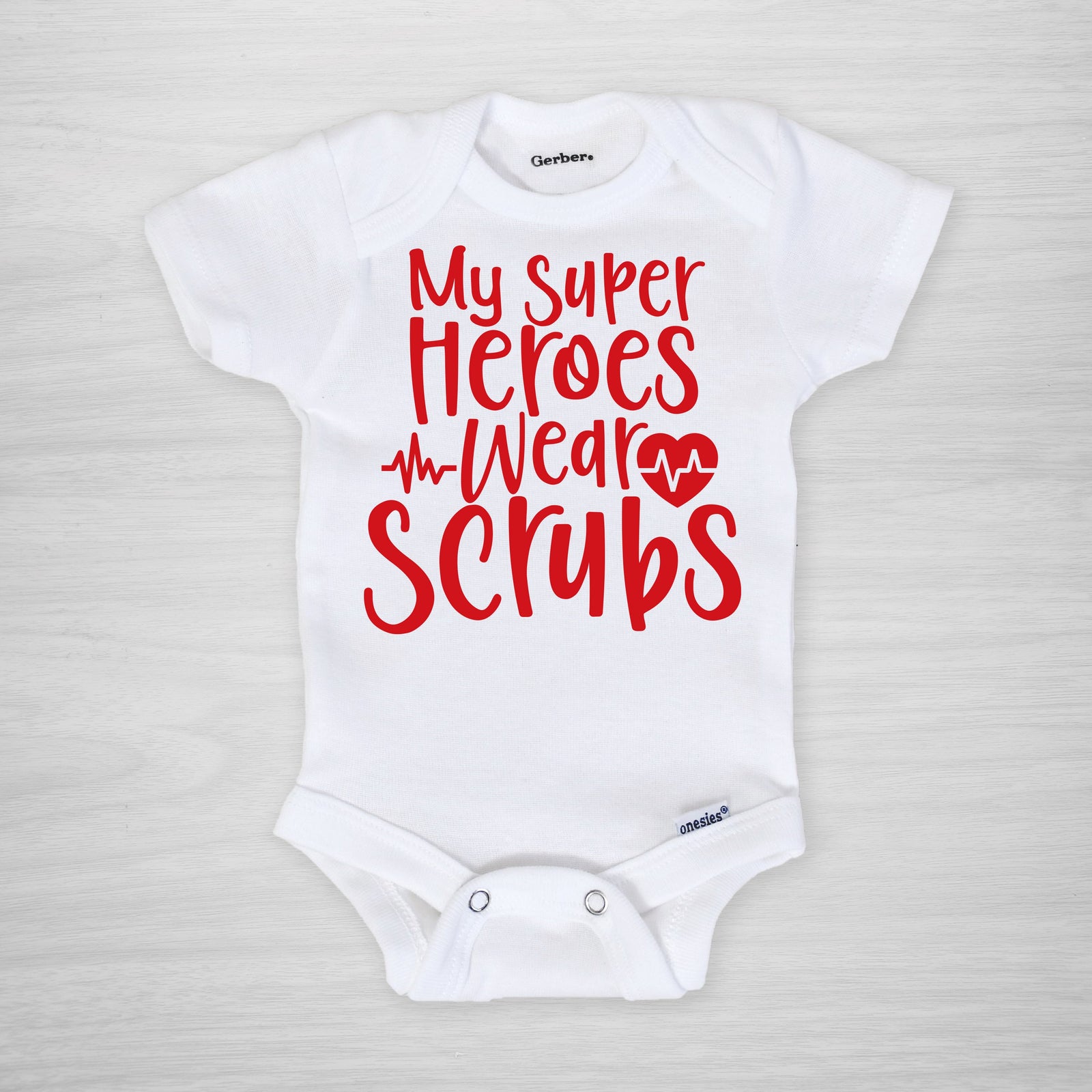 My Superheroes Wear Scrubs Onesie®