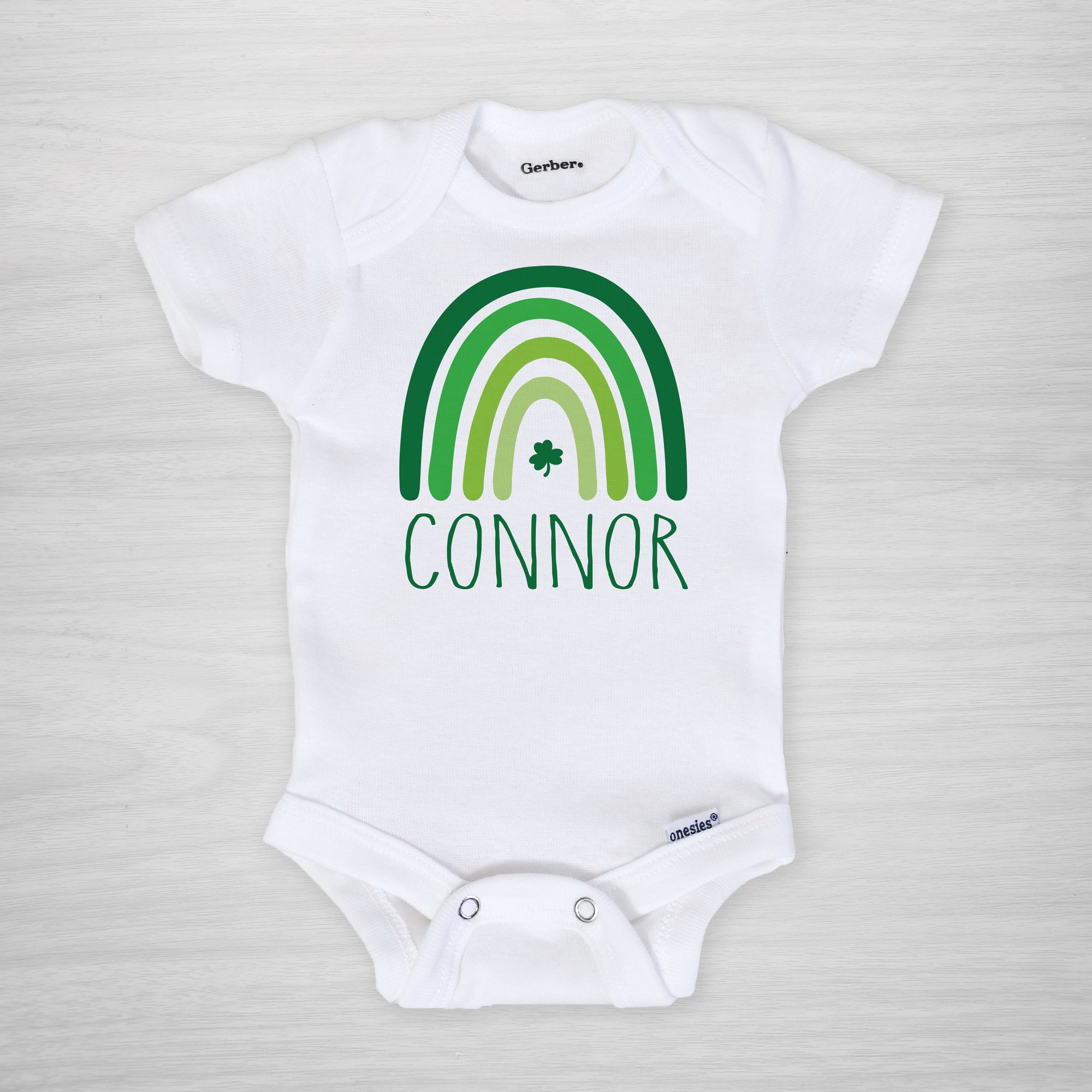St. Patrick's Day Onesie personalized with your little one's name. Perfect for boys or girls, short sleeved