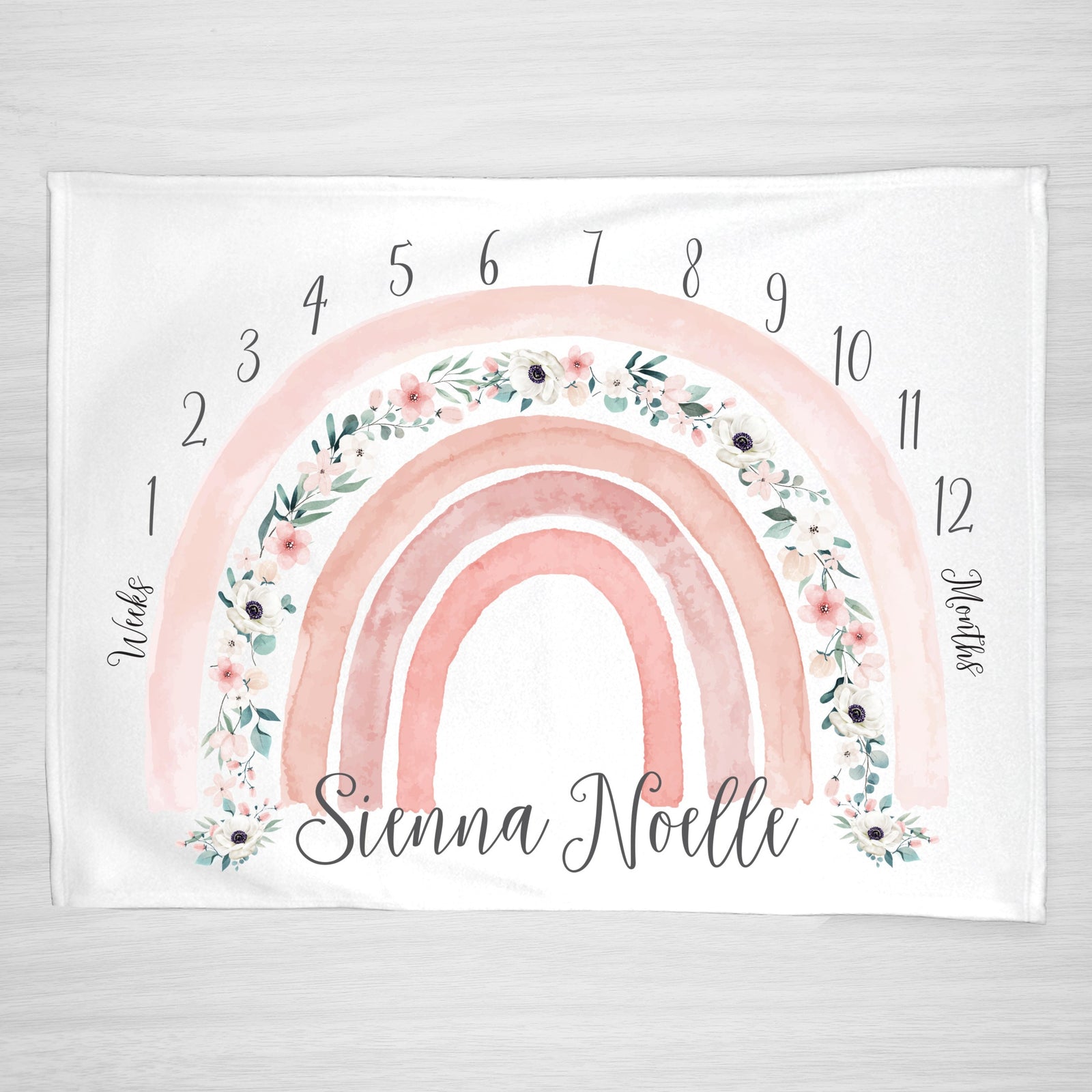 Rainbow Milestone Baby blanket in pink with floral accents. Super soft fleece