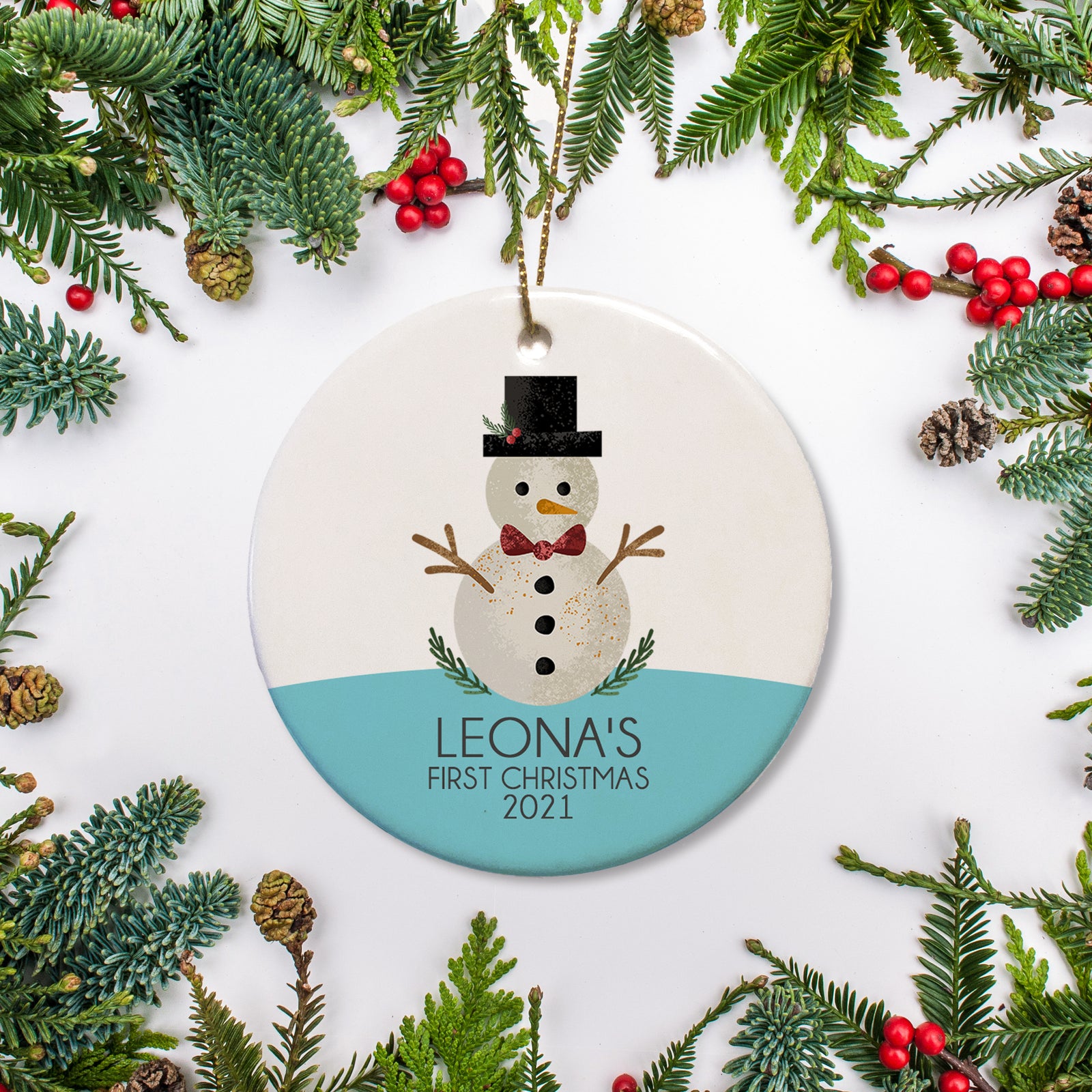Personalized Christmas Snowman ornament with blue accent - snowman has bowtie and top hat, personalized with name and year of your choice | PIPSY.COM