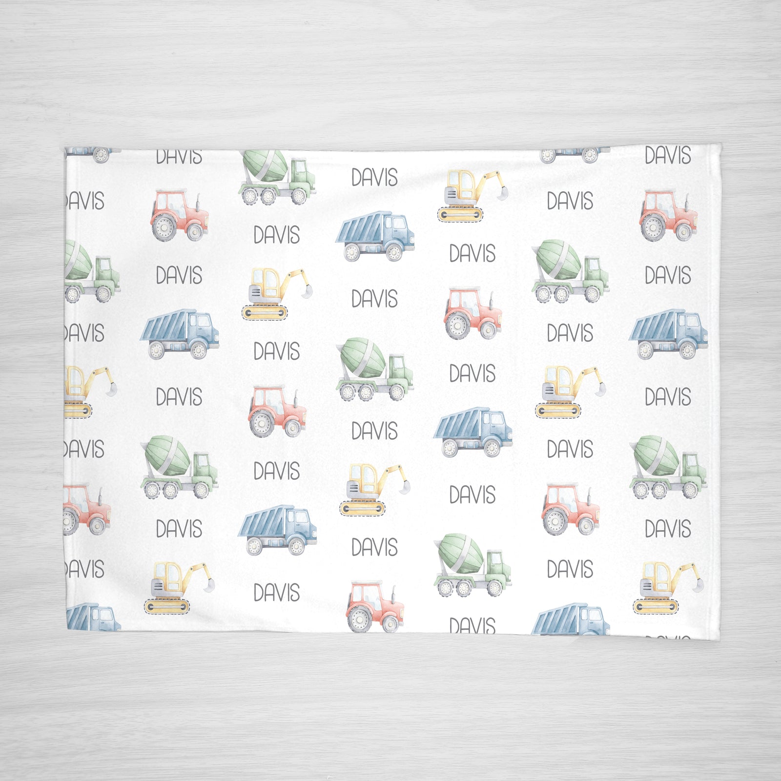 Truck Personalized Name Blanket, 100% fleece, featuring a backhoe, tractor, cement mixer, and dump truck