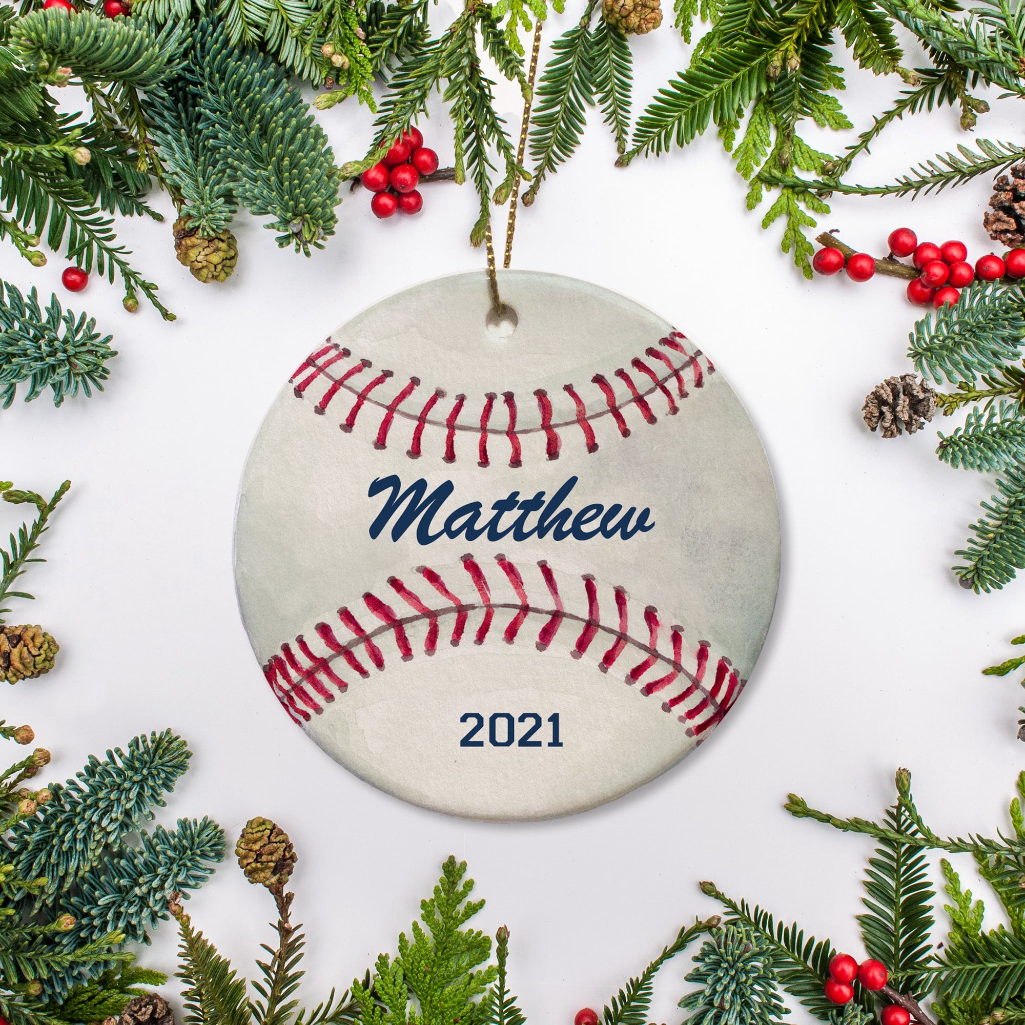 Watercolor baseball Christmas ornament with name and year of your choice. Looks like a worn leather baseball | PIPSY.COM