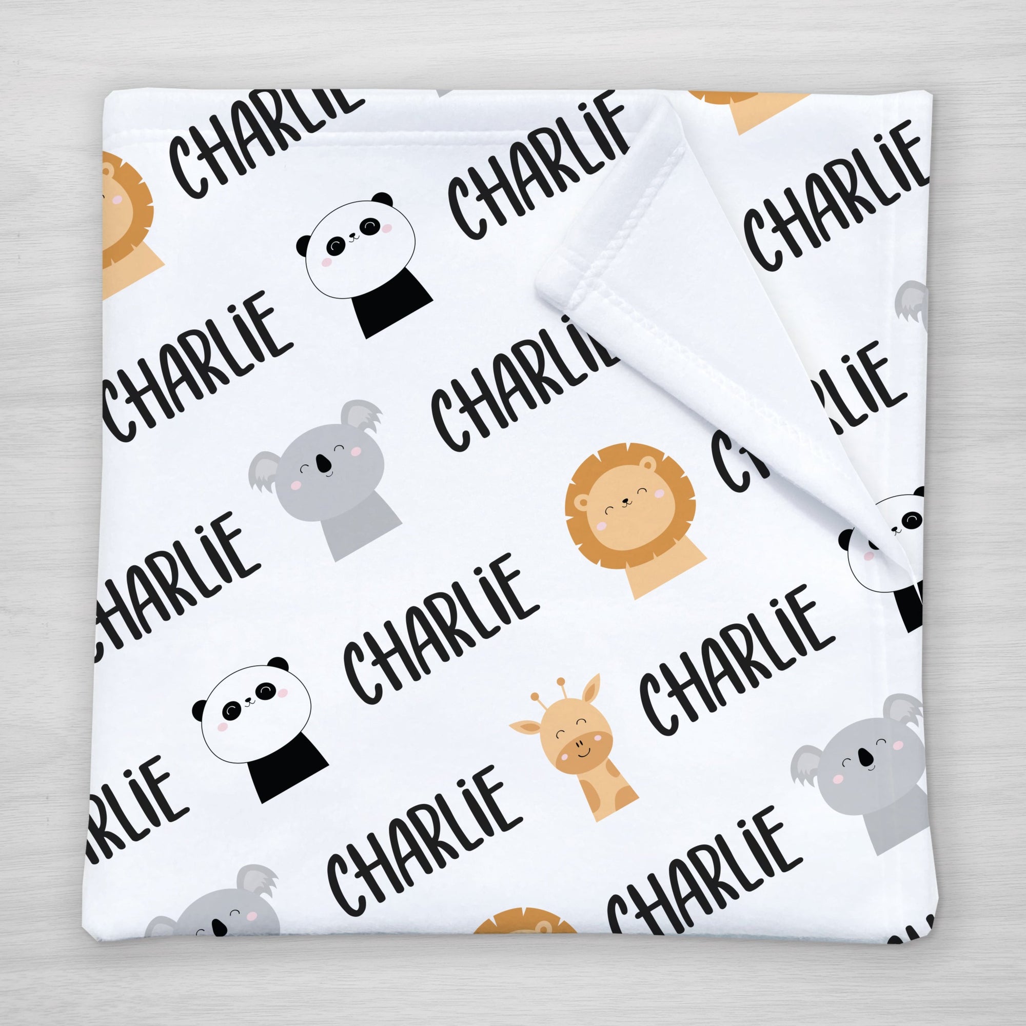 Our fun animal blanket is personalized with your little one's name. Featuring a lion, koala, panda, and giraffe. Choose a smaller size for a stroller blanket, or one of our huge sherpa blankets for a snuggle blanket that will be loved for years. 