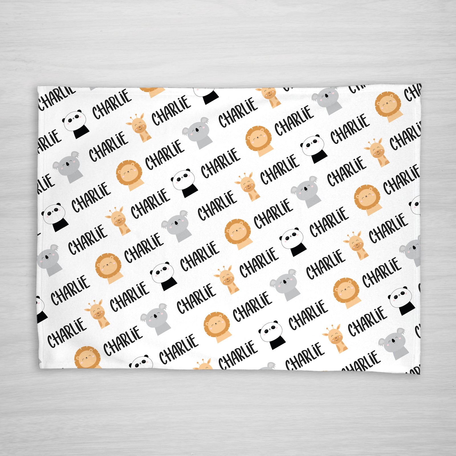 Our fun animal blanket is personalized with your little one's name. Featuring a lion, koala, panda, and giraffe. Choose a smaller size for a stroller blanket, or one of our huge sherpa blankets for a snuggle blanket that will be loved for years. 