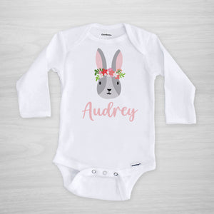 This onesie features a sweet Easter bunny with a crown of flowers, and your little one's name, long sleeved