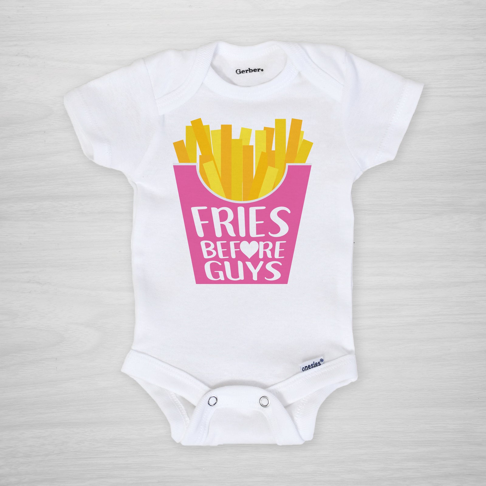 "Fries before Guys" funny onesie. Perfect for valentine's day. Genuine Gerber Onesie®, short sleeved