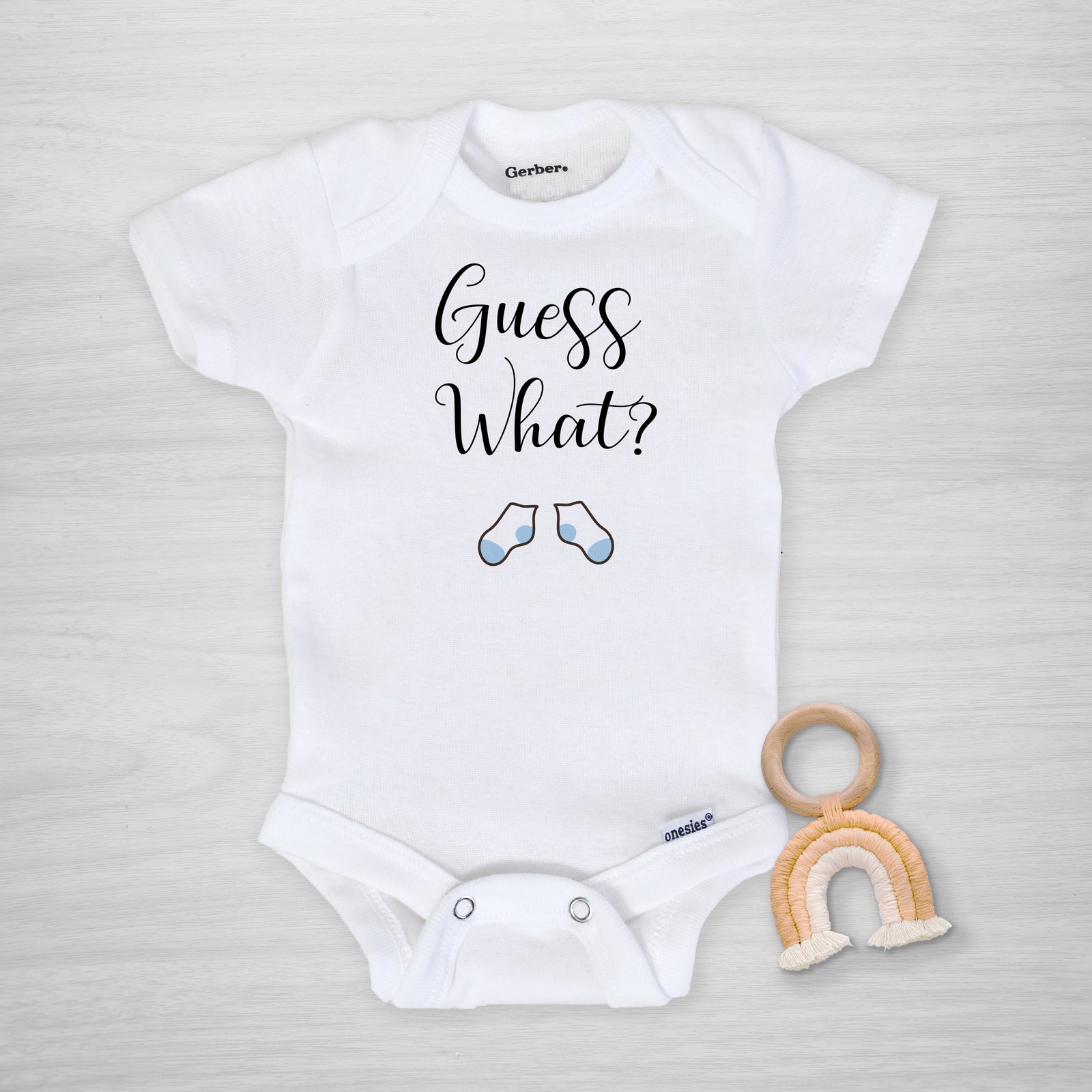 Guess What Pregnancy Announcement Gerber Onesie with blue socks, Pipsy.com, short sleeved
