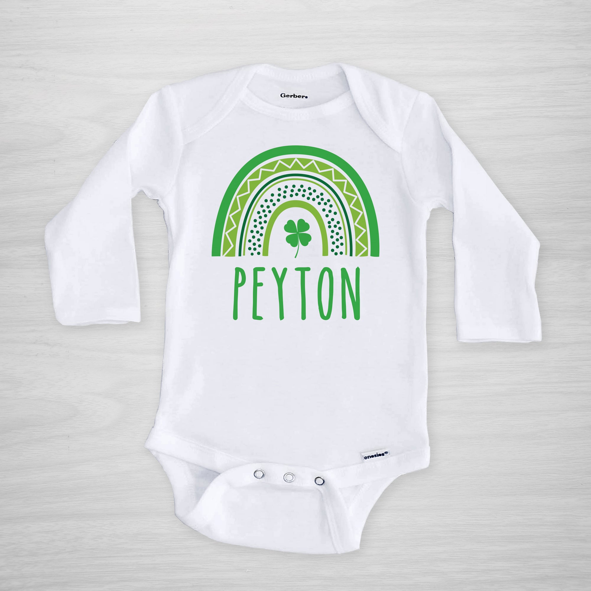 Personalized St. Patrick's Day Onesie® with a green modern rainbow and shamrock, short sleeved