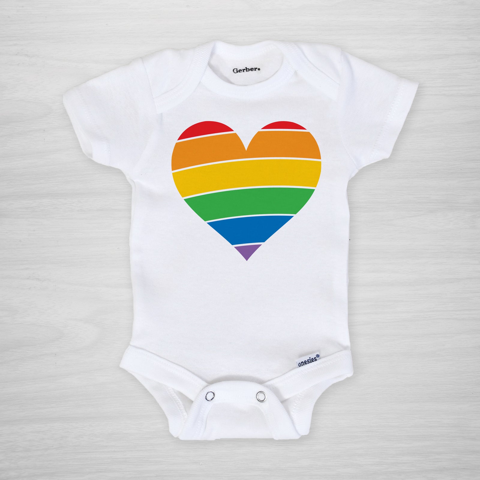 Rainbow Heart Onesie, Love is love, Perfect for Valentine's Day or Pride Week, short sleeved genuine Gerber Onesie® decorated with Pipsy artwork