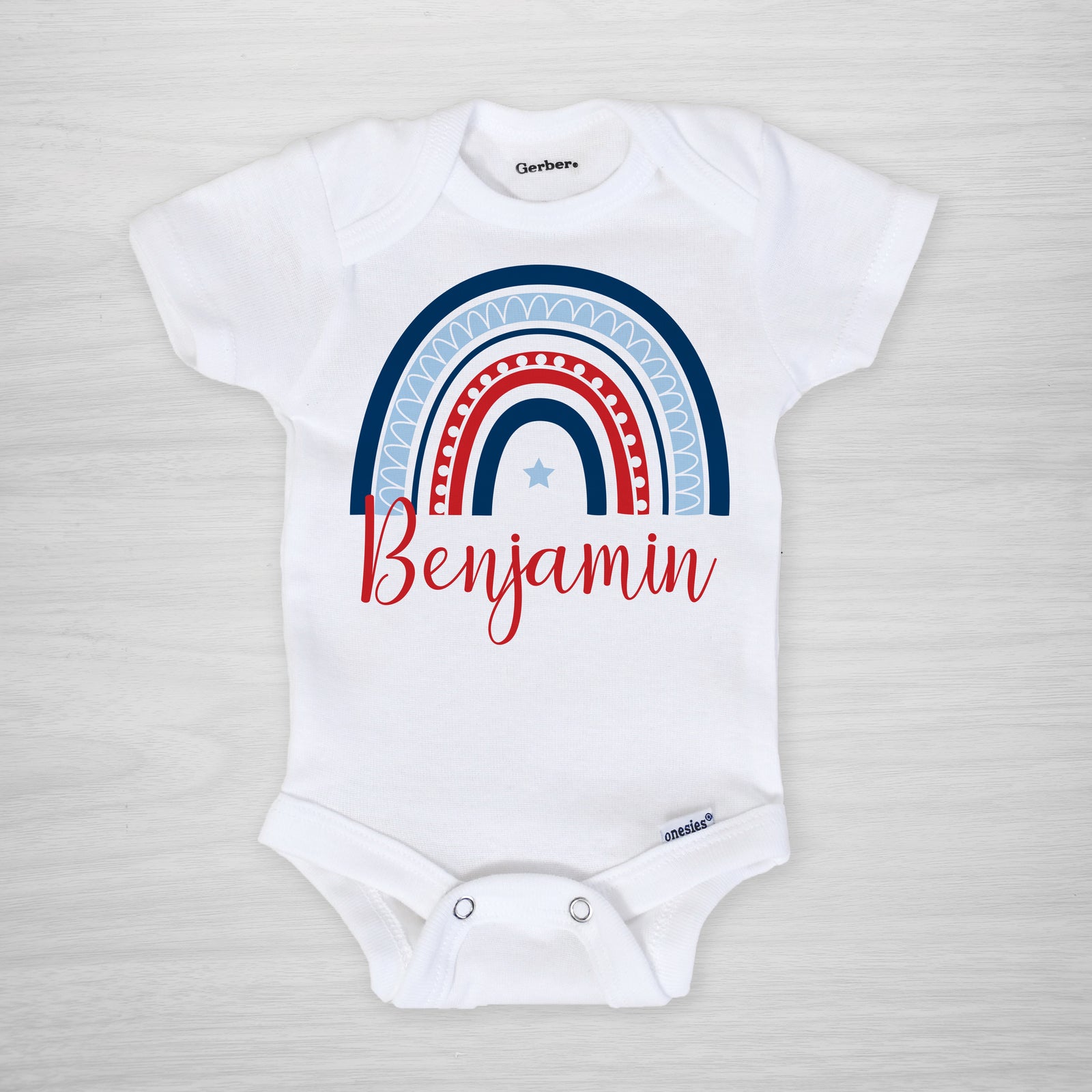 personalized 4th of july onesie with a modern rainbow in red, white and blue, short sleeved