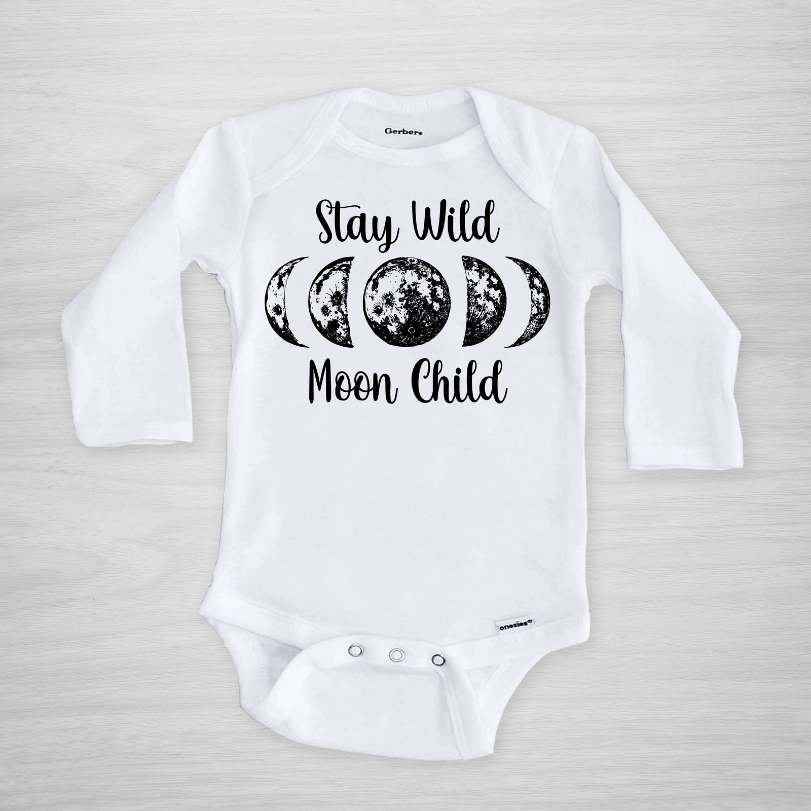 Stay Wild Moon Child Gerber Onesie® decorated wtih Pipsy artwork. Hand printed and pressed in our Nashville Studio. Long sleeved